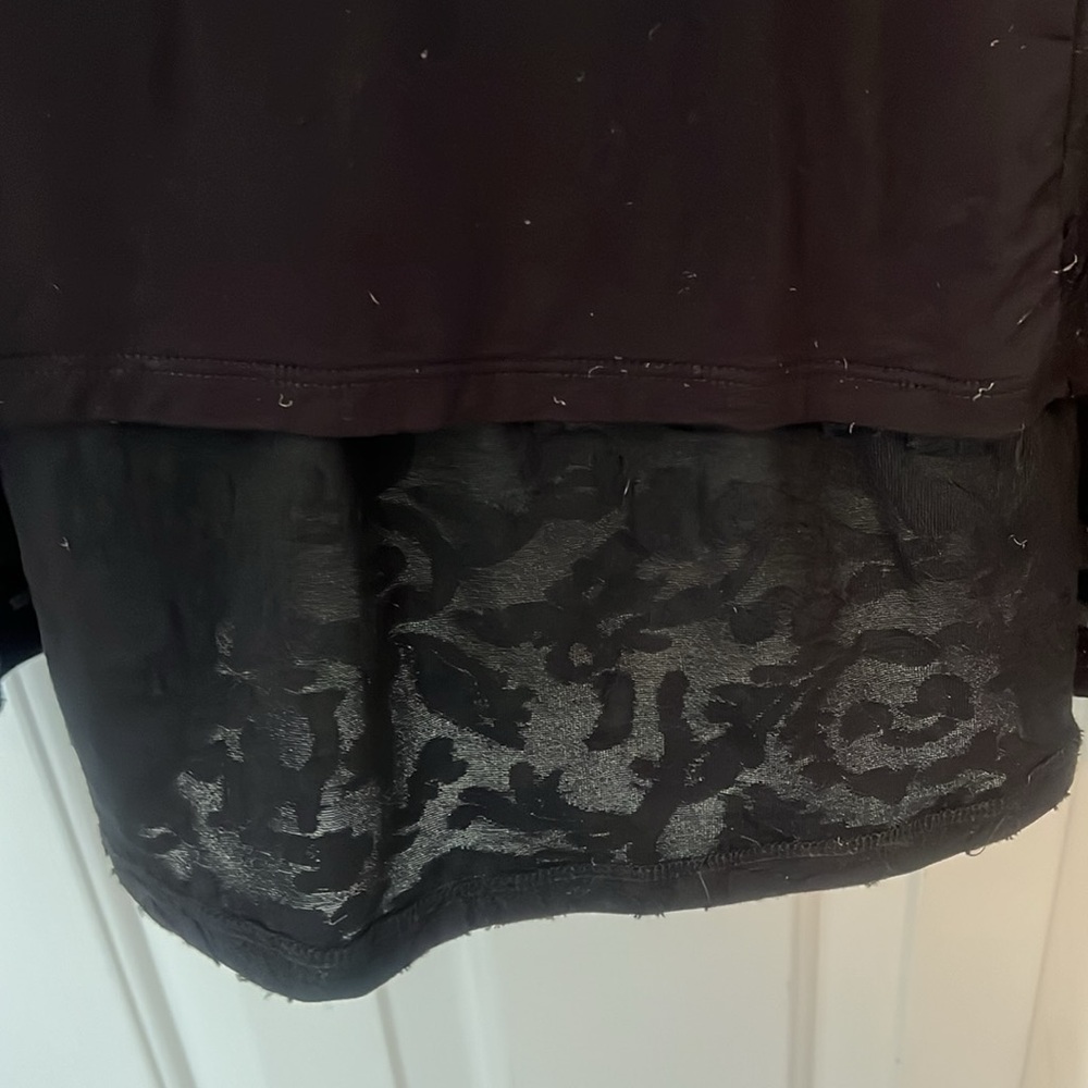 LOGO Black long sleeve women’s shirt with lace on the bottom - Picture 2 of 4